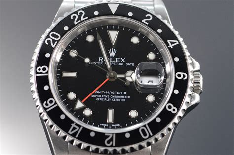 silver rolex with black face